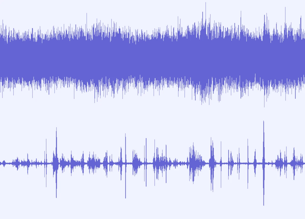 Audio waveforms showing one track with noise and another after noise reduction applied.